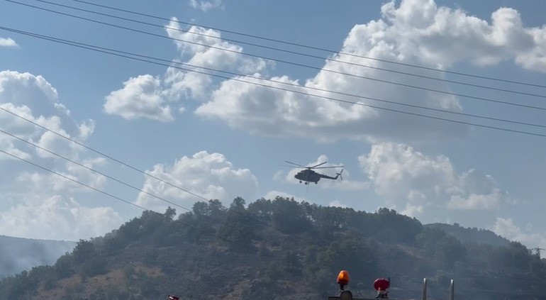 ANKARA'NIN KIZILCAHAMAM İLÇESİNDE EGREKKAYA BARAJININ YAKINLARINDA ORMANLIK ARAZİDE ÇIKAN YANGIN,