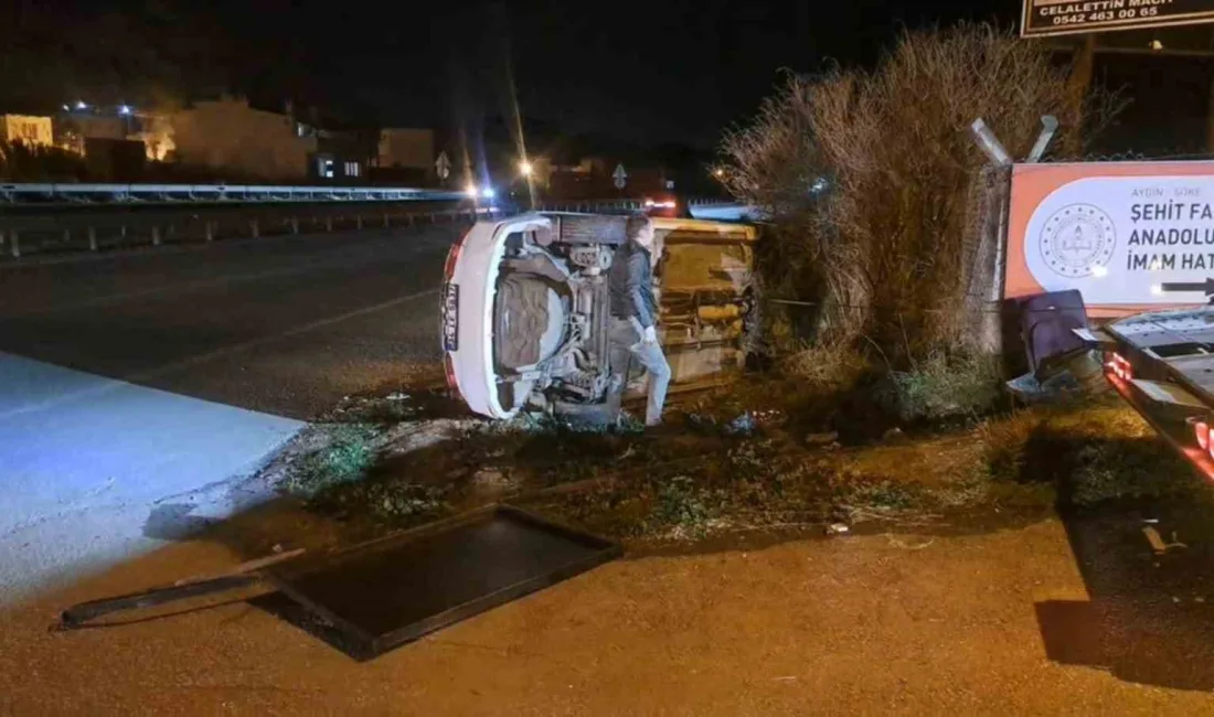 Aydın’ın Söke ilçesinde meydan gelen trafik kazasında otomobil yan yatarken,